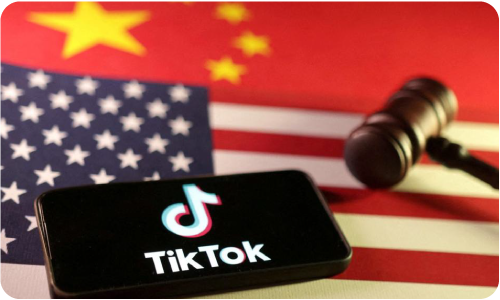 Chinese and US flag with the TikTok logo on the phone.